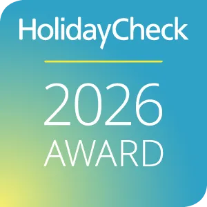 HolidayCheck 2026 Award Logo auf Farbverlauf