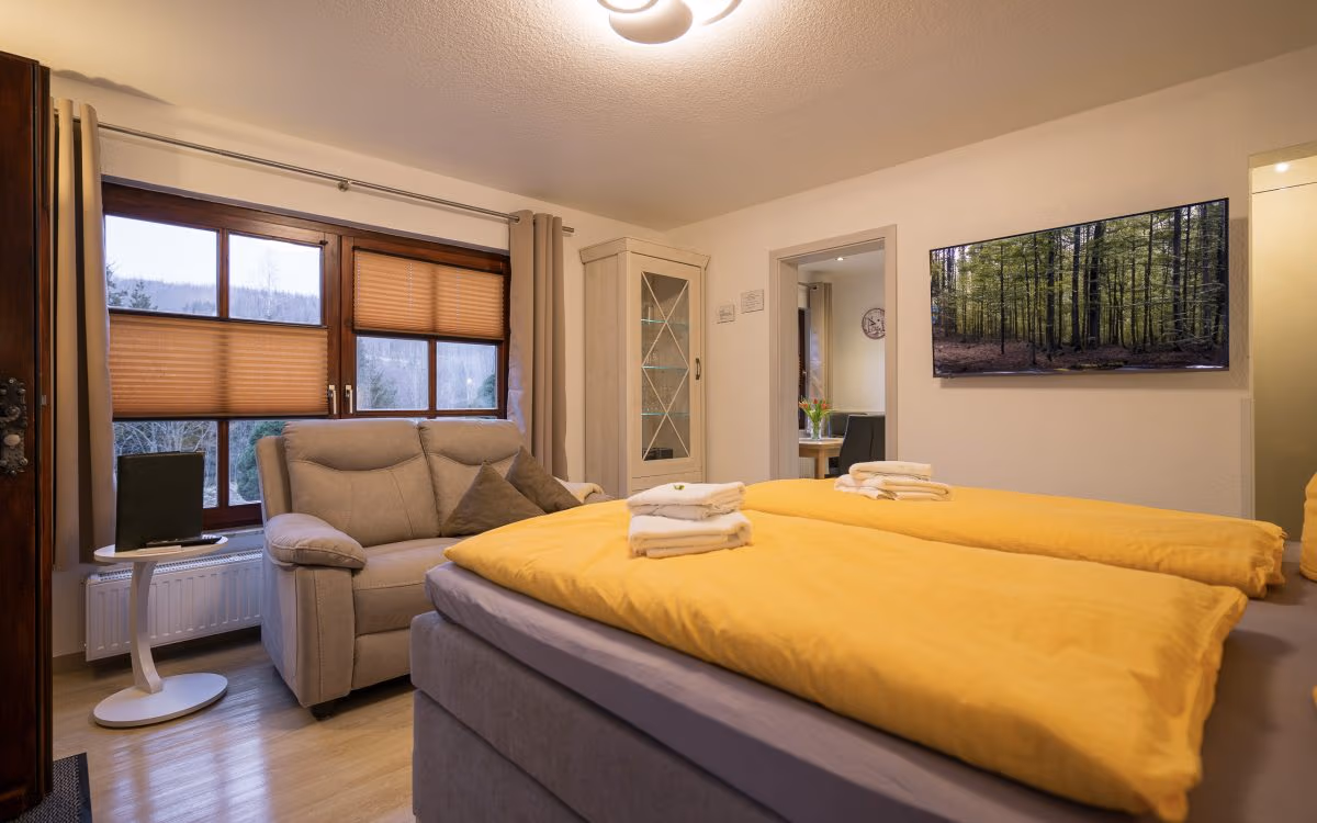 Cozy bedroom with modern furnishings.